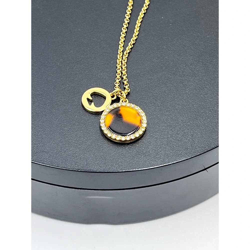 Kate Spade NY Spot The Spade‎ Brown Gold Plated Pave Charm necklace
